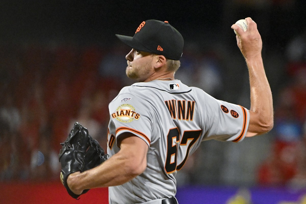 SF Giants relief pitcher Keaton Winn pitches in his Major League debut against the St. Louis Cardinals (2023)